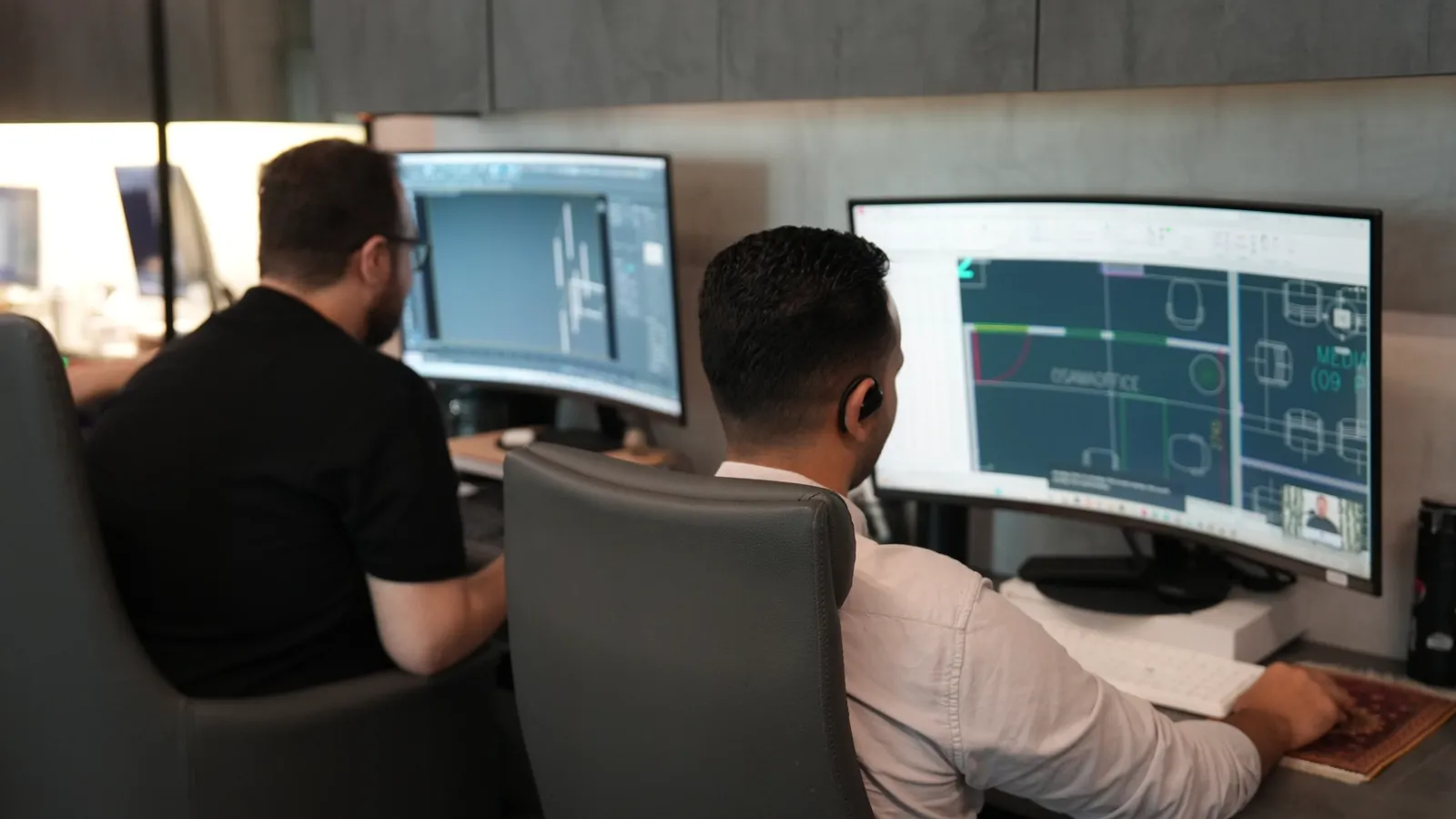 Technical team reviewing construction drawings