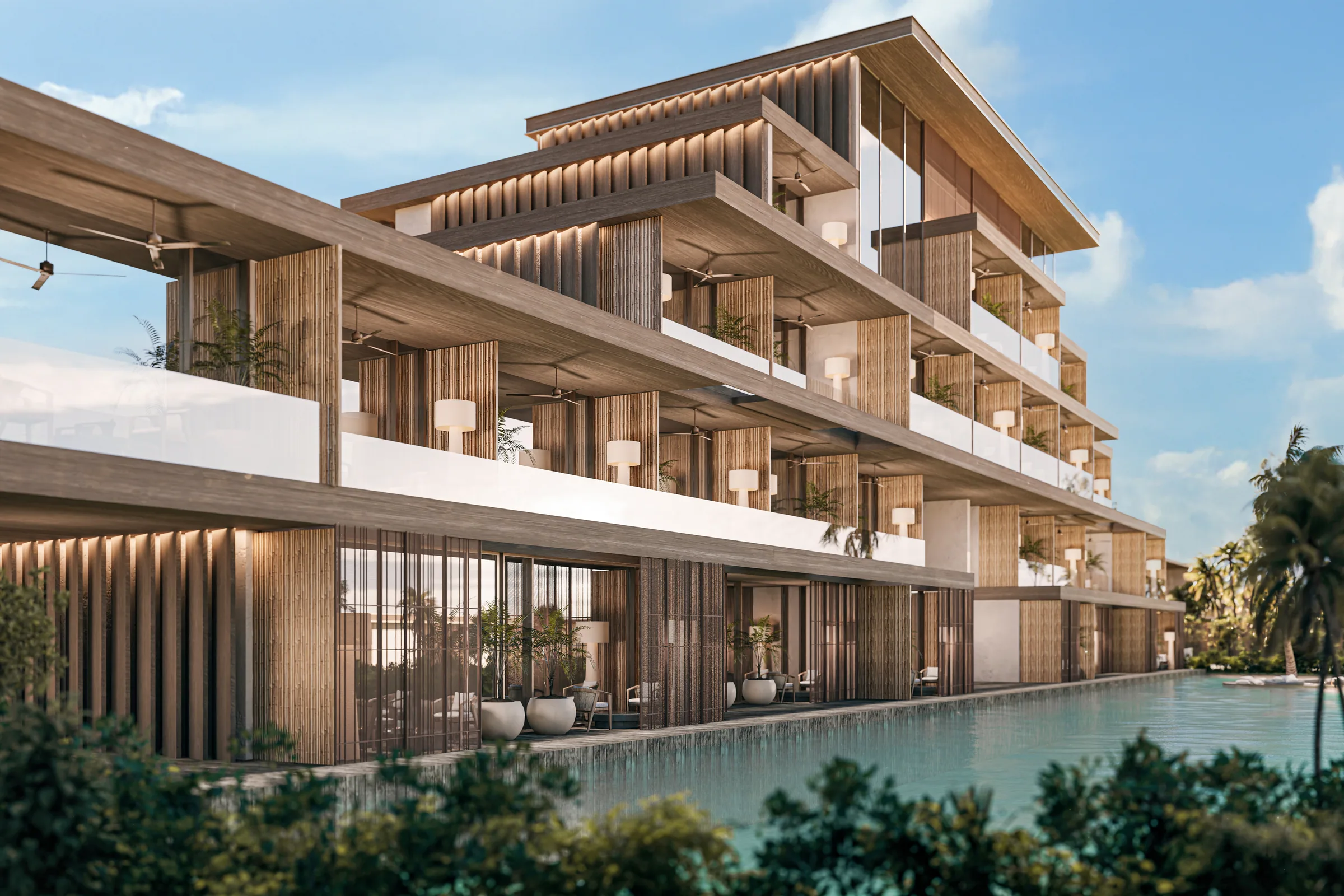 Terraced resort building with timber screens and a landscaped pool frontage